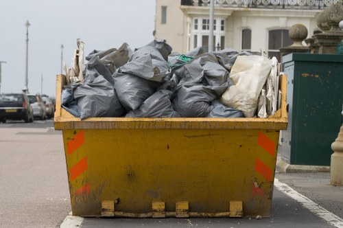 Waste collection skip placed on a residential property in Kilburn