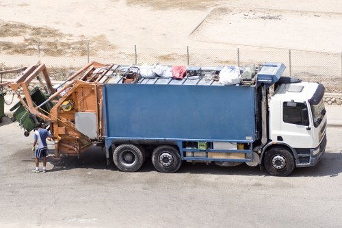 Inspectors conducting a supplier audit at a skip hire site